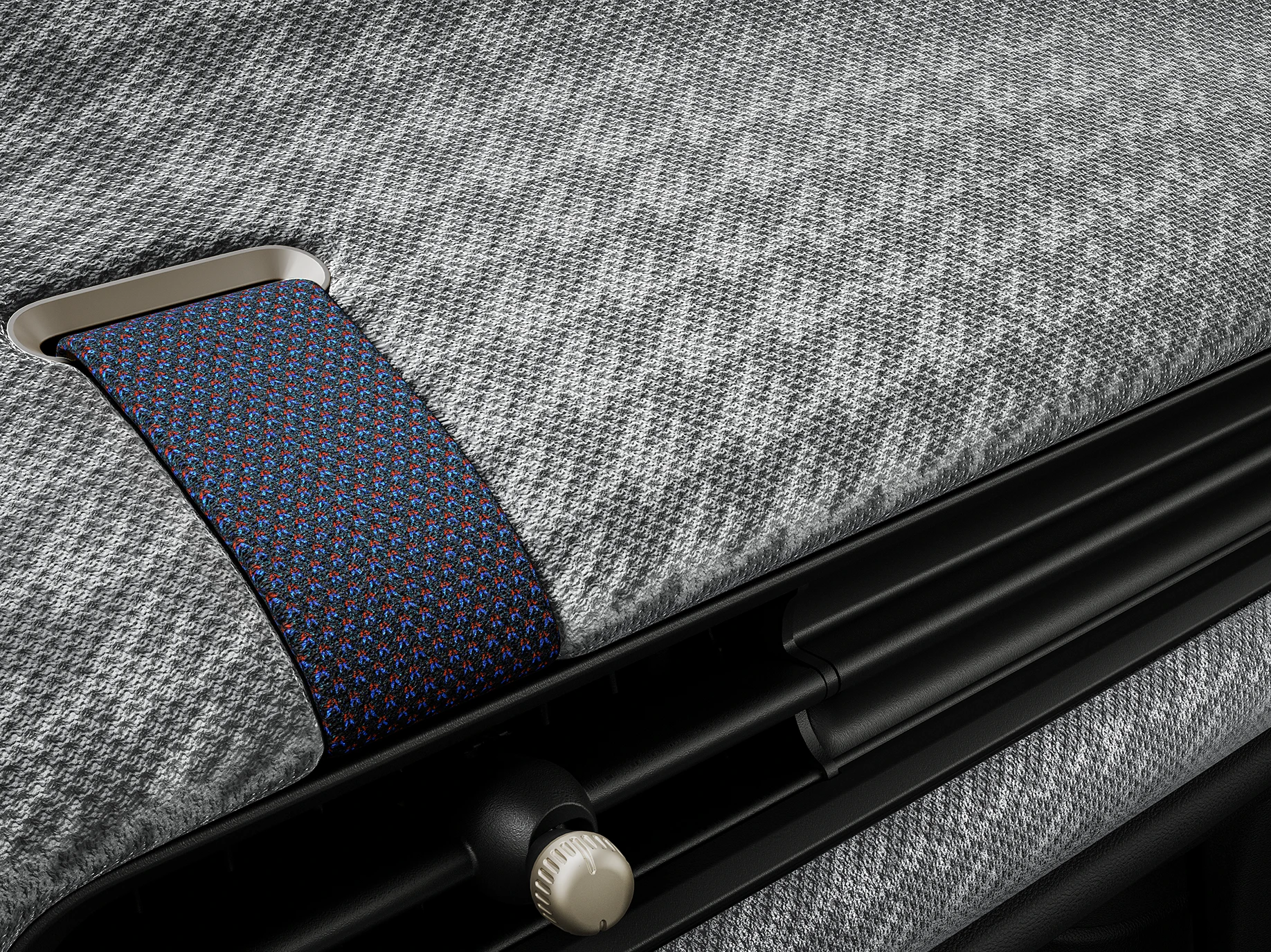 Поглед одблизу на контролната табла со 2D преплет во внатрешноста на MINI Cooper.